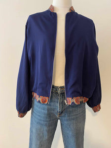 Bomber reversible fondo azul